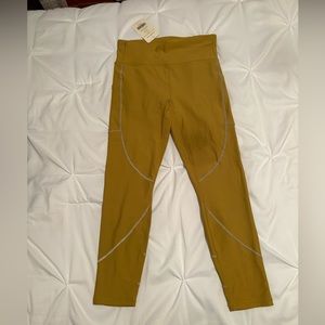 Fabletics High-waisted Cold Weather Reflective Pocket Legging, Gold, Lg/10-Short